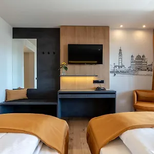 https://augsburg-hotel-sonnenhof.getmunichhotels.com